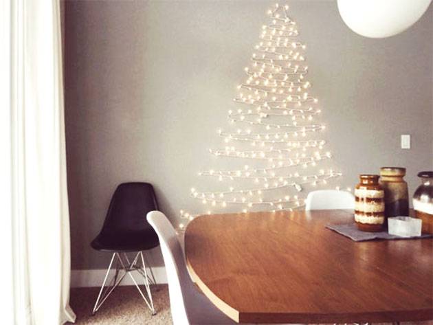 Essa &aacute;rvore de parede feita com luzes de Natal traz um charme encantado para sua casa.
