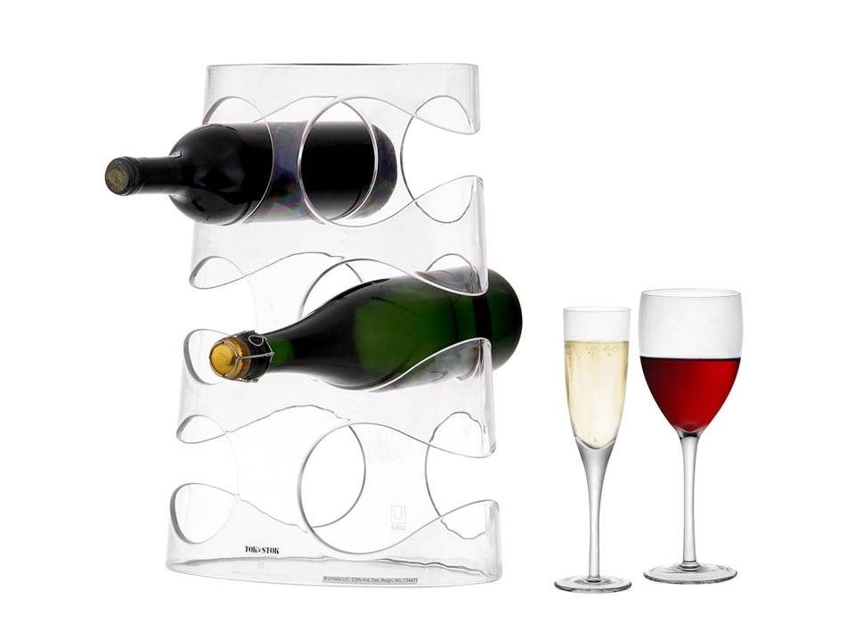 Exibir as garrafas de vinho em um suporte bem moderno vai dar um Up no bar do papai. Em acr&iacute;lico, tem 38 x 29 x 17,5cm de tamanho e capacidade para acomodar seis garrafas. Na Tok & Stok, o pre&ccedil;o &eacute; de R$ 54 na loja.