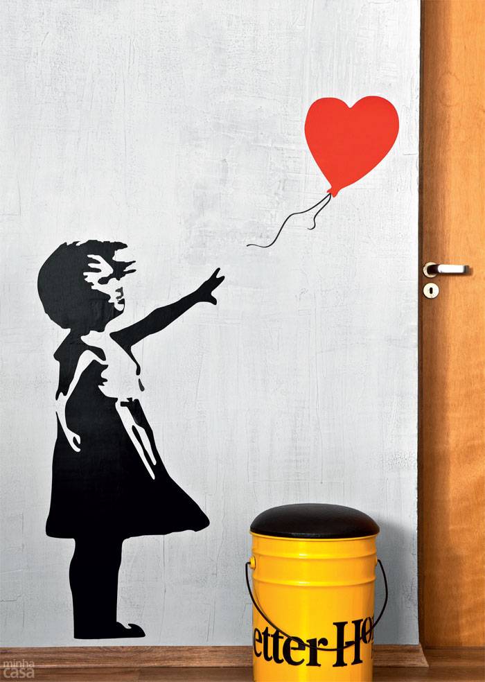 Grafite assinada pelo britânico Bansky personaliza parede