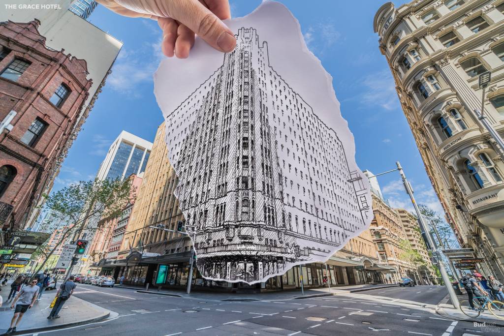 Constru&iacute;do na d&eacute;cada de 1920, o The Grace Hotel &eacute; uma afirma&ccedil;&atilde;o ousada e confiante da est&eacute;tica do 'arranha-c&eacute;u g&oacute;tico'. O revestimento de terracota vitrificada acrescenta glamour, enquanto o movimento ascendente dos contrafortes voadores e das janelas pontiagudas sugere a chegada iminente da resposta de Sidney ao Batman dos telhados. Os arquitetos, Morrow e Gordon, eram uma das principais empresas da &eacute;poca, e a constru&ccedil;&atilde;o de lajes e vigas de concreto armado era muito avan&ccedil;ada.