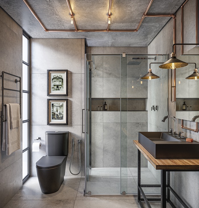 Banheiro de estilo industrial com parede de cimento queimado e tubulações expostas, cuba e bacia na cor preta