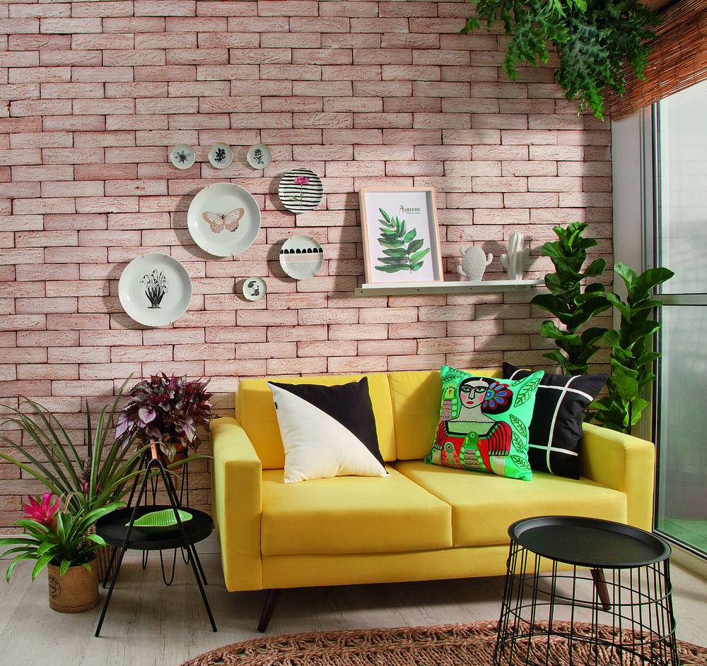 sala de estar e varanda com inspiracao urban jungle sofa