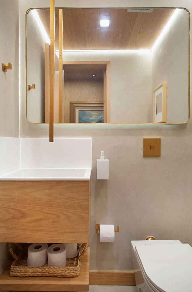 casal-reforma-apartamento-a-beira-mar-para-acolher-filhos-que-moram-longe-casa.com-paula-muller-denilson-machado-mca-estudio-18 Lavabo