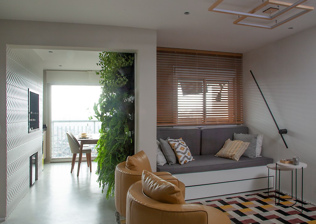Sala de estar integrada com varanda