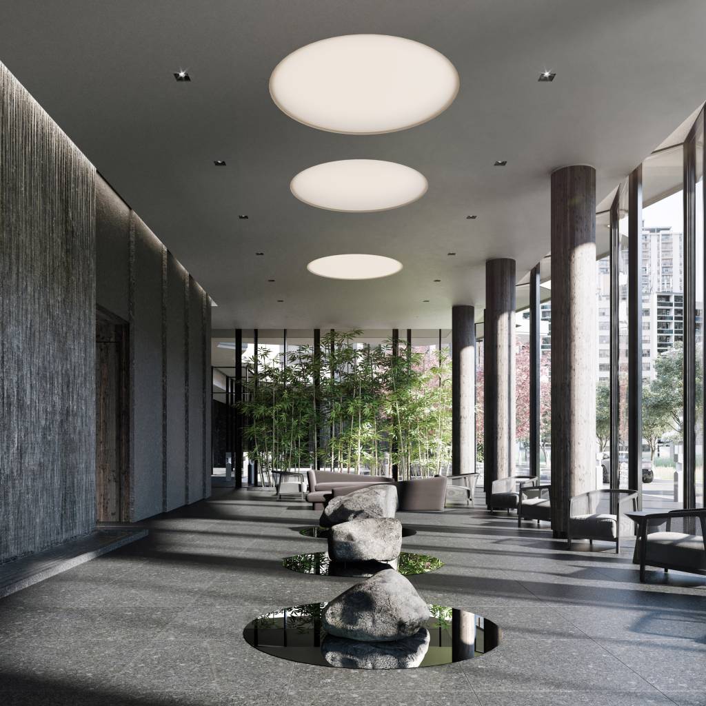 10 peças de design criadas por celebridades Dezeen (3) Hall de prédio com pé-direito estendido. À direita, longas pilastras lançam sobras decorrentes das paredes de vidro que deixam os sol entrar.