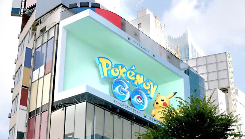 Este anúncio de Pokemón 3D salta da tela Designboom (3) Outdoor tridimensional em esquina de prédio com pokemon.