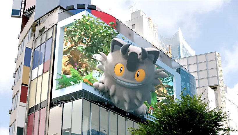 Este anúncio de Pokemón 3D salta da tela Designboom (4) Outdoor tridimensional em esquina de prédio com pokemon.