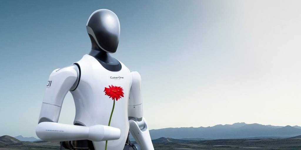 O robô da Xiaomi detecta 45 emoções Designboom (5) Robô humanoide com carcaça em preto e branco.