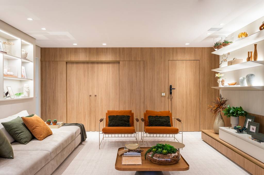 ape-230-m2-home-office-escondido-espaco-especial-pets-mrc-credito-thiago-travesso-sala (23) Apê 230 m2 home office escondido espaço especial pets MRC arq.design decoração sala estar estante poltrona madeira mesa sofa