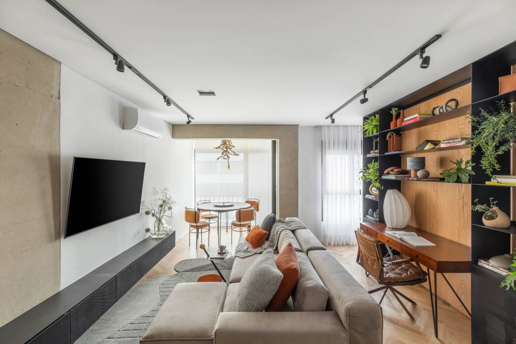 Lavabo de apê de 58 m² é cubo em concreto com relevo geométrico