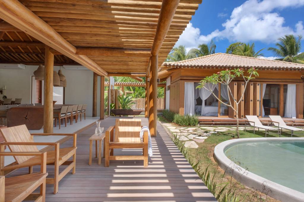 casa-de-praia-terrea-e-dividida-em-5-modulos-e-tem-decoracao-rustica-db-arquitetos-07-varanda-rustico Casa de praia térrea é dividida em 5 módulos e tem decoração rústica. Projeto de DB Arquitetos.